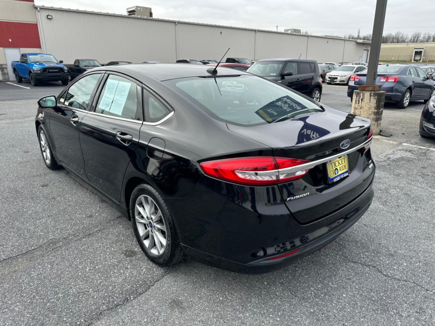 2017 BLACK Ford Fusion SE (3FA6P0HDXHR) with an 1.5L L4 DOHC 16V engine, 6A transmission, located at 1254 Manheim Pike, Lancaster, PA, 17601, (717) 393-9133, 40.062870, -76.323273 - Photo#6